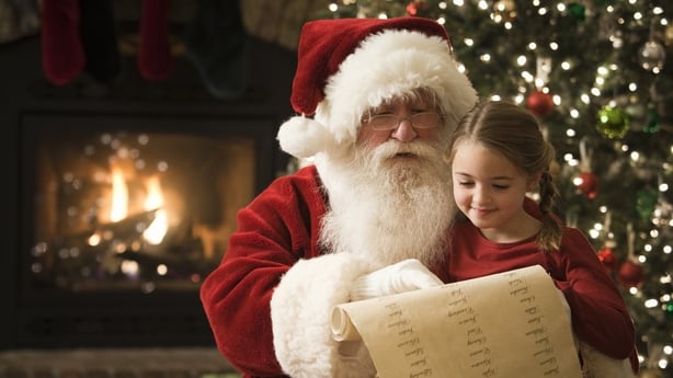 Santa with a little girl at Christmas