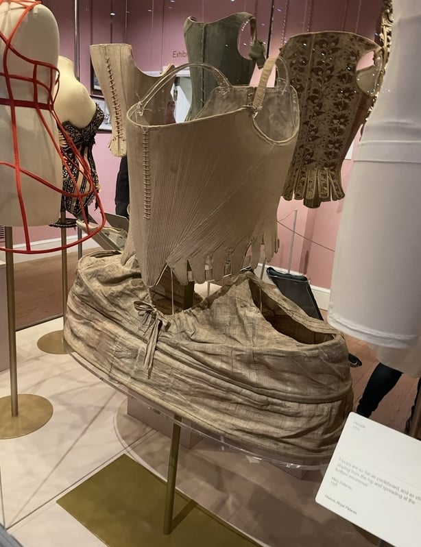 Display model wearing a corset