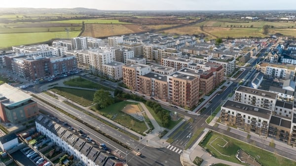 A computer generated image of a new block of apartments and green spaces