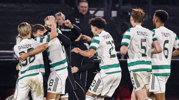 Benjamin Nygren of Celtic FC celebrates with teammates after scoring his teams third goal during the UEFA Europa League 2025/26 League Phase MD5 match between Feyenoord Rotterdam and Celtic FC at De Kuip on November 27, 2025 in Rotterdam, Netherlands.