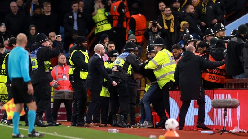 Police arrest a Young Boys fans during the game at Villa Park