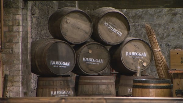 Whiskey barrels sitting on top of each other