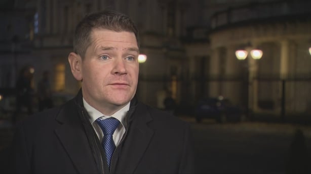 Minister Peter Burke speaking outside Leinster House