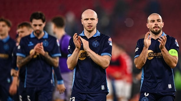 Kerr McInroy, left, and Mark Coyle after Shelbourne's loss to AZ Alkmaar in 2025-26 Conference League 