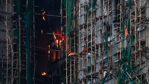 Fire burning inside an apartment block in Hong Kong.