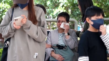 Hong Kong residents searching for relatives after deadly fire