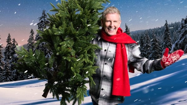 Patrick Kielty poses with a Christmas tree in a promo shot for The Toy Show