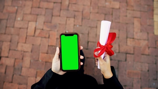 Person, hands and a green phone screen with a certificate for graduation