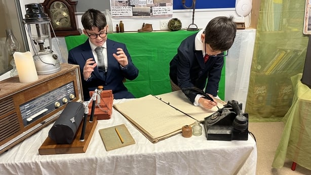 Photo shows schoolchildren Oisín Joye and Daragh O'Malley reenacting wireless communication