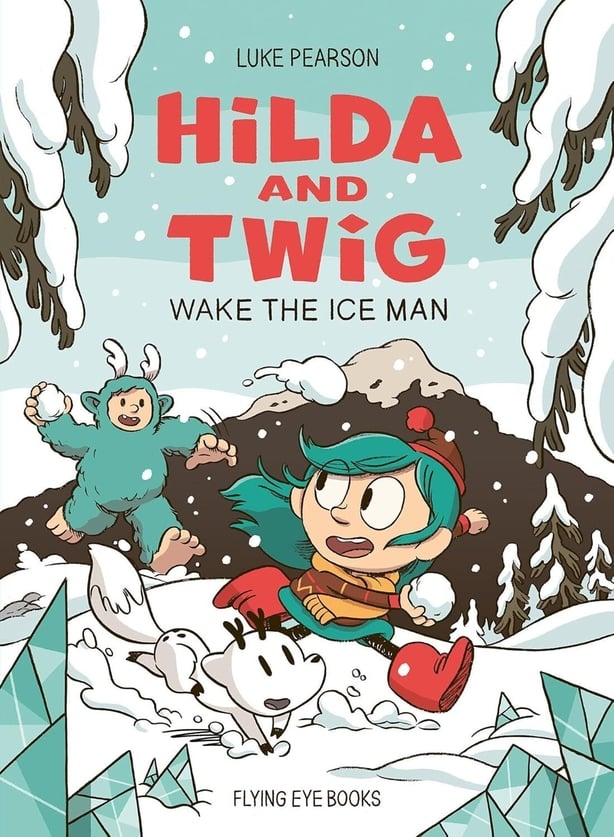 A book cover with two characters running through snow throwing snowballs with text Hilda and Twig Wake the Ice Man