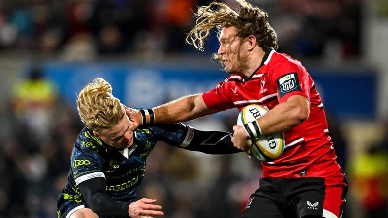 Ulster's Werner Kok hands off Louis Werchon of Benetton
