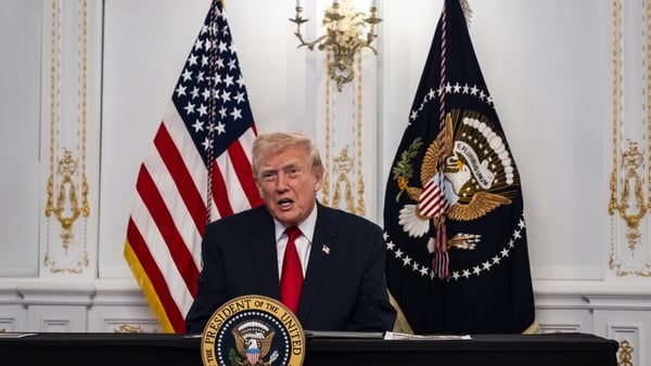 PALM BEACH, FLORIDA - NOVEMBER 27: President Donald Trump participates in a call with U.S. service members from his Mar-a-Lago club in Florida on Thanksgiving Day on November 27, 2025 in Palm Beach, Florida. (Photo by Pete Marovich/Getty Images)
