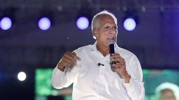 A man speaks on stage