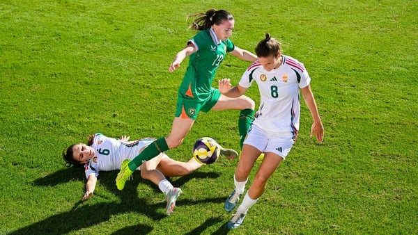 29 November 2025; Abbie Larkin of Republic of Ireland in action against Borbala Vincze, left, and Viktoria Szabo of Hungary during the women's international friendly match between Republic of Ireland and Hungary at Marbella Football Centre in Marbella, Sp