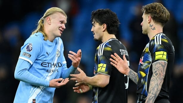 MANCHESTER, ENGLAND - NOVEMBER 29: Erling Haaland of Manchester City speaks with Pascal Struijk of Leeds United after the Premier League match between Manchester City and Leeds United at Etihad Stadium on November 29, 2025 in Manchester, England. (Photo by Shaun Botterill/Getty Images)