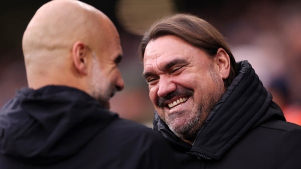 MANCHESTER, ENGLAND - NOVEMBER 29: Daniel Farke, Manager of Leeds United, speaks with Pep Guardiola, Manager of Manchester City, prior to the Premier League match between Manchester City and Leeds United at Etihad Stadium on November 29, 2025 in Mancheste