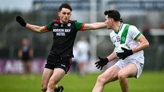 30 November 2025; Gearard Davoren of Maigh Cuilinn in action against Brian Stack of St Brigid’s during the AIB Connacht GAA Football Senior Club Championship final match between St Brigid's and Maigh Cuilinn at King & Moffatt Dr Hyde Park in Roscommon. Ph