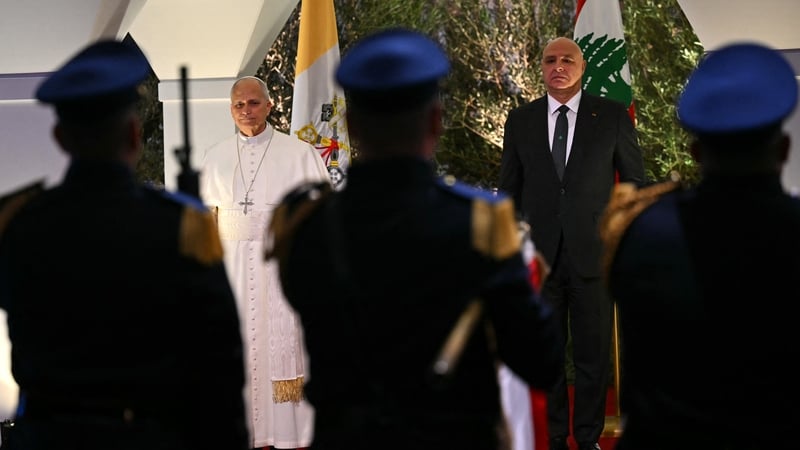 Pope Leo XIV is welcomed by Lebanese President Joseph Aoun upon his arrival at Beirut International Airport