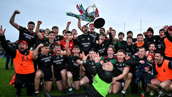 30 November 2025; St Brigid’s manager Anthony Cunningham, centre, throws up the cup in celebration with his players after they won the AIB Connacht GAA Football Senior Club Championship final match between St Brigid's and Maigh Cuilinn at King & Moffatt D