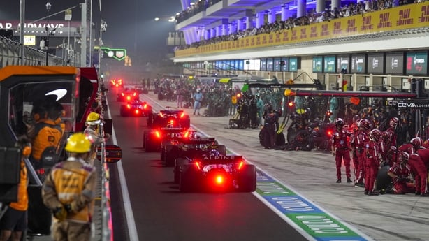 Drivers pit during the safety car during the Formula One Qatar Grand Prix at the Lusail International Circuit in Lusail on November 30, 2025.