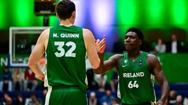 30 November 2025; Sam Alajiki of Ireland, right, celebrates with team-mate Neal Quinn during the FIBA EuroBasket 2029 Pre-Qualifiers Group A match between Ireland and North Macedonia at the National Basketball Arena in Dublin. Photo by Shauna Clinton/Sportsfile