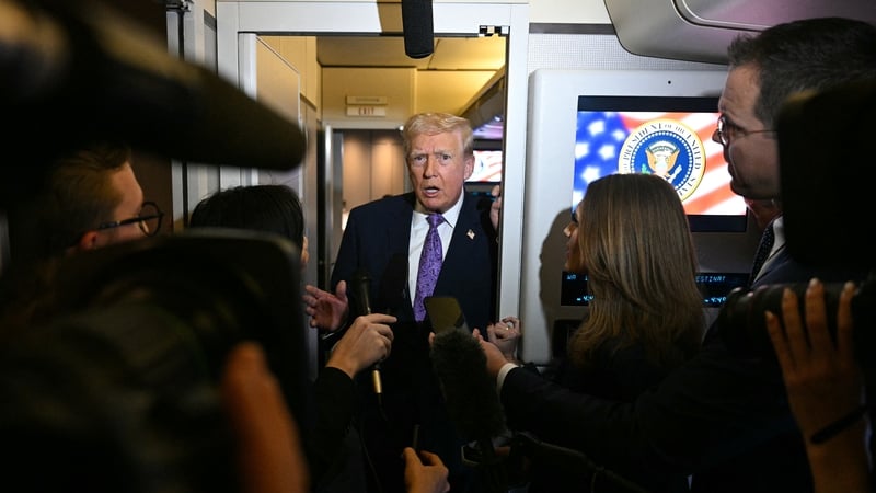 US President Donald Trump spoke to journalists aboard Air Force One