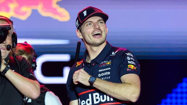 Yuki Tsunoda and Max Verstappen of Oracle Red Bull Racing participate in race day at Lusail International Circuit in Qatar on November 30, 2025. (Photo by Ahmad AlShehab/NurPhoto via Getty Images)