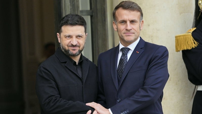 French President Emmanuel Macron welcoming Ukrainian President Volodymyr Zelenksy at the Elysee Palace in Paris