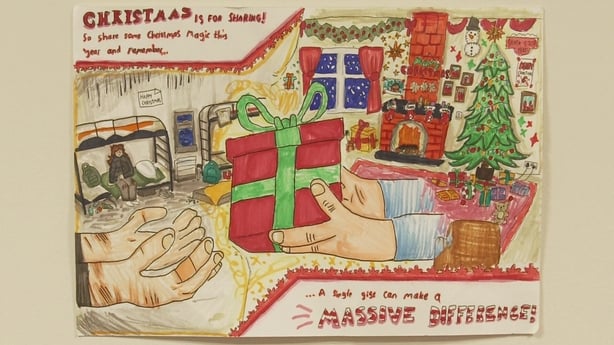A child's drawing of a room with a fireplace with a Christmas tree and decorations.