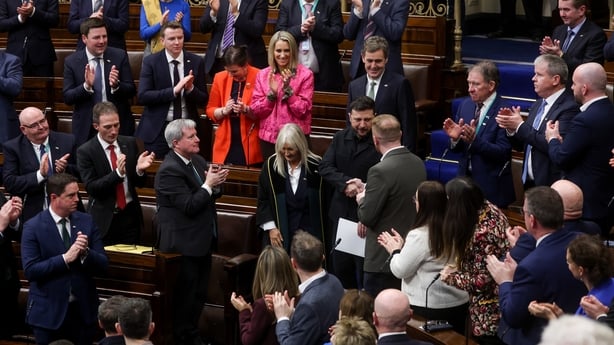President of Ukraine Volodymyr Zelensky is greeted by politicians as he enters the Dail