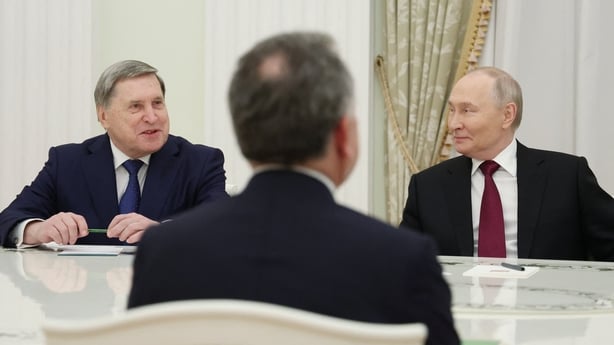 Russia's President Vladimir Putin and Kremlin aide Yuri Ushakov attend a meeting with US special envoy Steve Witkoff at the Kremlin 