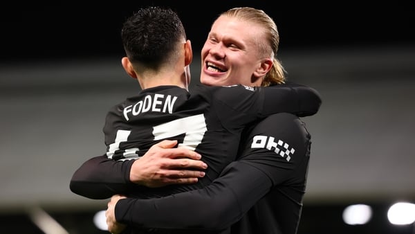 Phil Foden of Manchester City celebrates with Erling Haaland after he scored his second goal for 1-4 during the Premier League match between Fulham and Manchester City at Craven Cottage on December 2, 2025 in London, United Kingdom