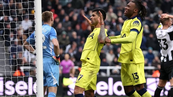 NEWCASTLE UPON TYNE, ENGLAND - DECEMBER 02: Cristian Romero of Tottenham Hotspur (L) celebrates scoring his team's second goal with teammate Destiny Udogie (R) during the Premier League match between Newcastle United and Tottenham Hotspur at St James' Par