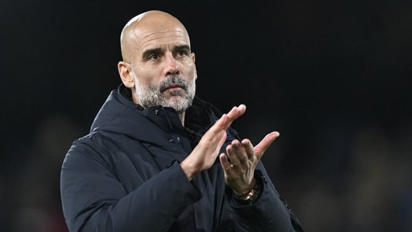 Josep Guardiola manager of Manchester City applauds the fans during the Premier League match between Fulham and Manchester City at Craven Cottage on December 2, 2025 in London, England.