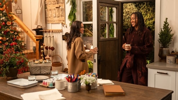 Meghan Markle, Britain's Duchess of Sussex (left) and Naomi Osaka in the With Love, Meghan: Holiday Celebration