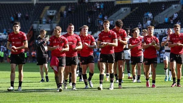 HULL, ENGLAND - AUGUST 10: Salford Red Devils' and Hull FC players applaud the Salford fans at the end of the match
 during the Betfred Super League Round 21 match between Hull FC and Salford Red Devils at MKM Stadium on August 10, 2025 in Hull, England.