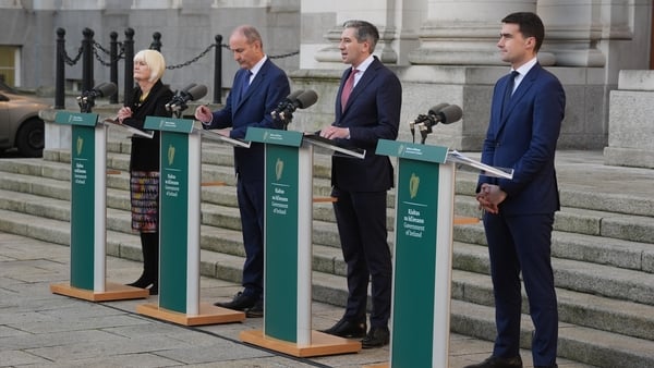 (left to right) Marian Harkin Micheal Martin Simon Harris Jack Chambers all standing at podiums