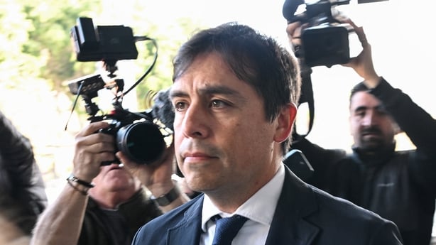 Salvador Plasencia surrounded by photographers