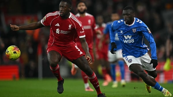 Sunderland's Dutch striker #09 Brian Brobbey (R) vies with Liverpool's French defender #05 Ibrahima Konate