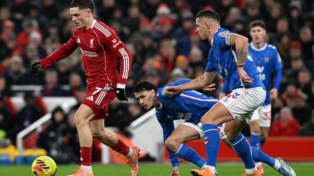  Florian Wirtz of Liverpool runs with the ball whilst under pressure from Granit Xhaka of Sunderland during the Premier League match between Liverpool and Sunderland at Anfield on December 03, 2025 in Liverpool, England. (Photo by Liverpool FC/Liverpool FC via Getty Images)