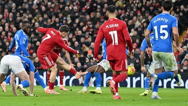 Florian Wirtz of Liverpool shoots on goal which is deflected off of Nordi Mukiele of Sunderland, for an own goal, Liverpool's first goal of the game, during the Premier League match between Liverpool and Sunderland at Anfield on December 03, 2025 in Liver