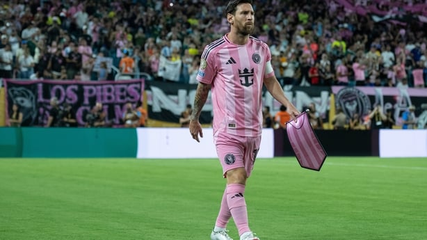 Lionel Messi #10 of Inter Miami CF walks with the match pennant prior to the FIFA Club World Cup 2025 group A match between Internacional CF Miami and SE Palmeiras at Hard Rock Stadium on June 23, 2025 in Miami Gardens, United States. (Photo by Sebastian Frej/Getty Images)