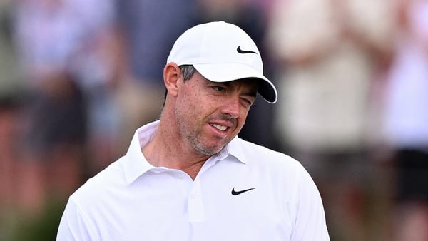 Rory McIlroy reacts during the first round of the Australian Open golf tournament at the Royal Melbourne Golf Club in Melbourne on December 4, 2025.