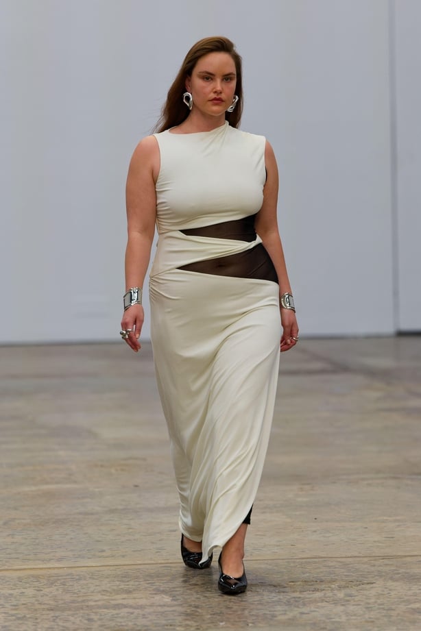 Model wearing dress with sheer panels