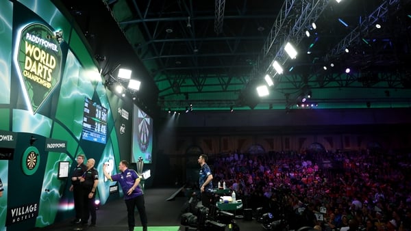 A general view as Luke Littler of England throws during the 2023/24 Paddy Power World Darts Championship Final between Luke Littler of England and Luke Humphries of England on Day Sixteen of the 2023/24 Paddy Power World Darts Championship at Alexandra Pa