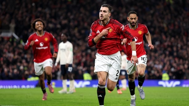MANCHESTER, ENGLAND - DECEMBER 04: Diogo Dalot of Manchester United celebrates scoring his team's first goal during the Premier League match between Manchester United and West Ham United at Old Trafford on December 04, 2025 in Manchester, England. (Photo by Justin Setterfield/Getty Images)