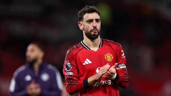 MANCHESTER, ENGLAND - DECEMBER 04: Bruno Fernandes of Manchester United applauds the fans after the draw in the Premier League match between Manchester United and West Ham United at Old Trafford on December 04, 2025 in Manchester, England. (Photo by Justi
