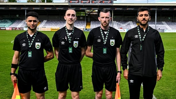4 May 2025; Referee Ruben Collins, second from left, and his officials after the FAI Youth Cup final match between Mervue United and College Corinthians at Eamonn Deacy Park in Galway. Photo by Tyler Miller/Sportsfile 