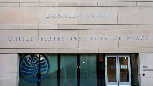 WASHINGTON, DC - DECEMBER 03: U.S. President Donald Trump's name is seen recently placed on the outside of the United States Institute of Peace (USIP) building headquarters on December 03, 2025 in Washington, DC. This addition was made ahead of the Trump administration hosting a deal-signing between