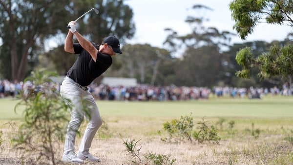 MELBOURNE, AUSTRALIA - DECEMBER 05: Rory McIlroy of Northern Ireland plays his second shot from the rough on the 17th hole on day two of the Crown Australian Open 2025 at The Royal Melbourne Golf Club on December 05, 2025 in Melbourne, Australia. (Photo b